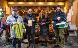 Prominenter Besuch beim Caritas-Stand auf dem Weihnachtsmarkt